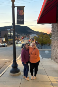 ECIC staff members posing for a photo outdoors in Helena, Montana.